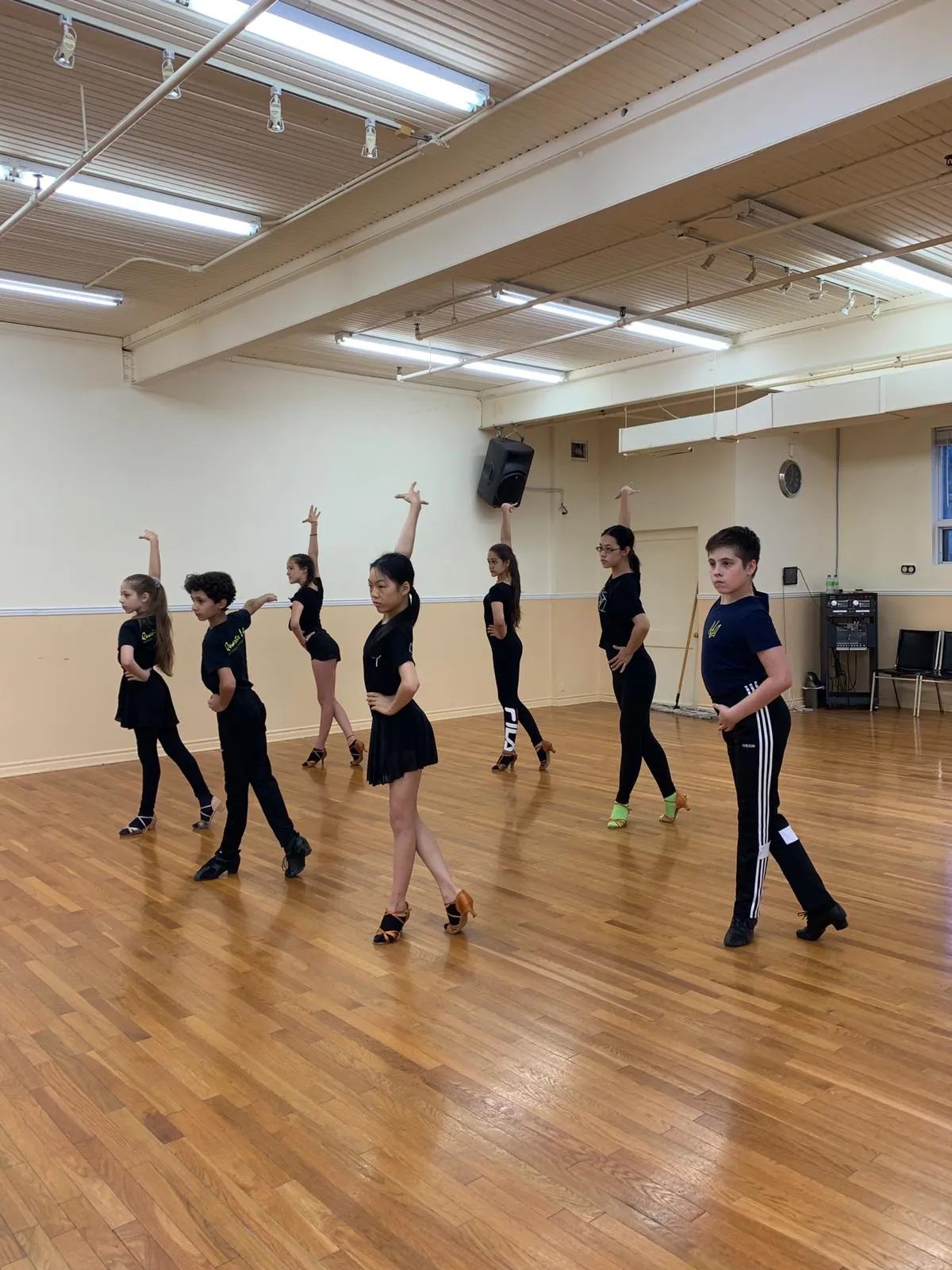 Children practising Latin dance in the studio