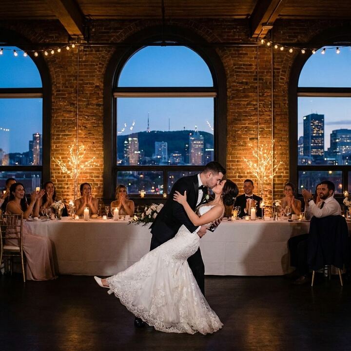 Couple dancing bachata at Montreal wedding venue at night