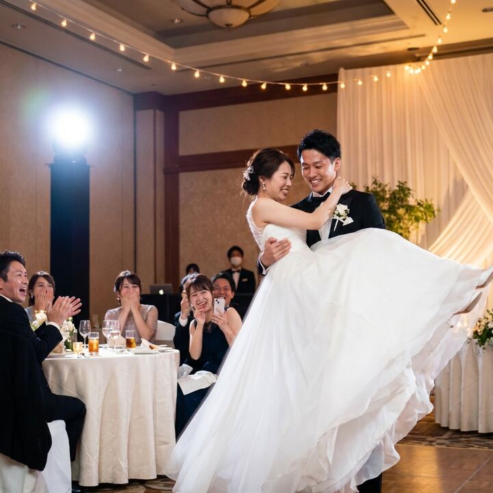 Couple performing surprise wedding dance with guests reacting